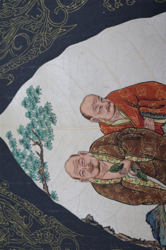 A Chinese painting of two luohan, on a leaf